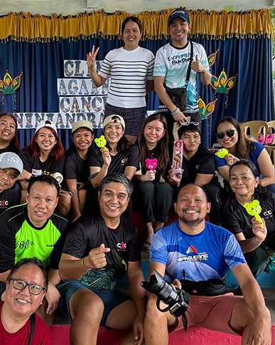 Dr Joyce Regalado and CAC team for Christmas in the Mountains Camiguin